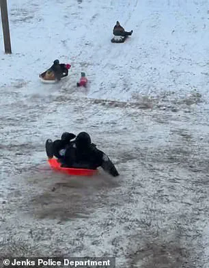 Chaotic Snow Day Incident in Jenks: Officer's Accidental Collision with Child Goes Viral, Sparking Mixed Reactions