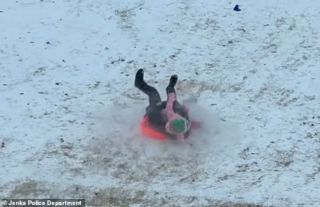 Chaotic Snow Day Incident in Jenks: Officer's Accidental Collision with Child Goes Viral, Sparking Mixed Reactions